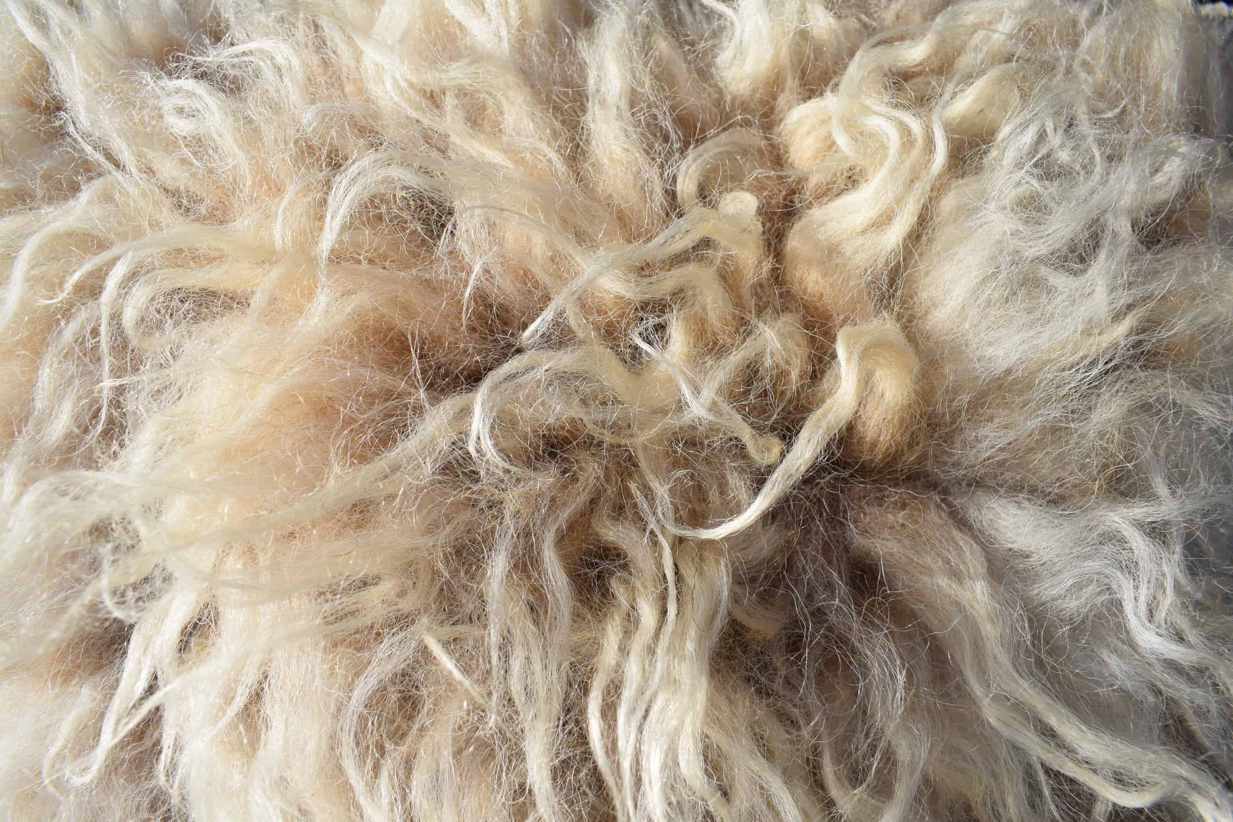 felted fleece wool sheepskinpegloom woven wool cushion handmade moorit grey brown natural wool patchwork sheep