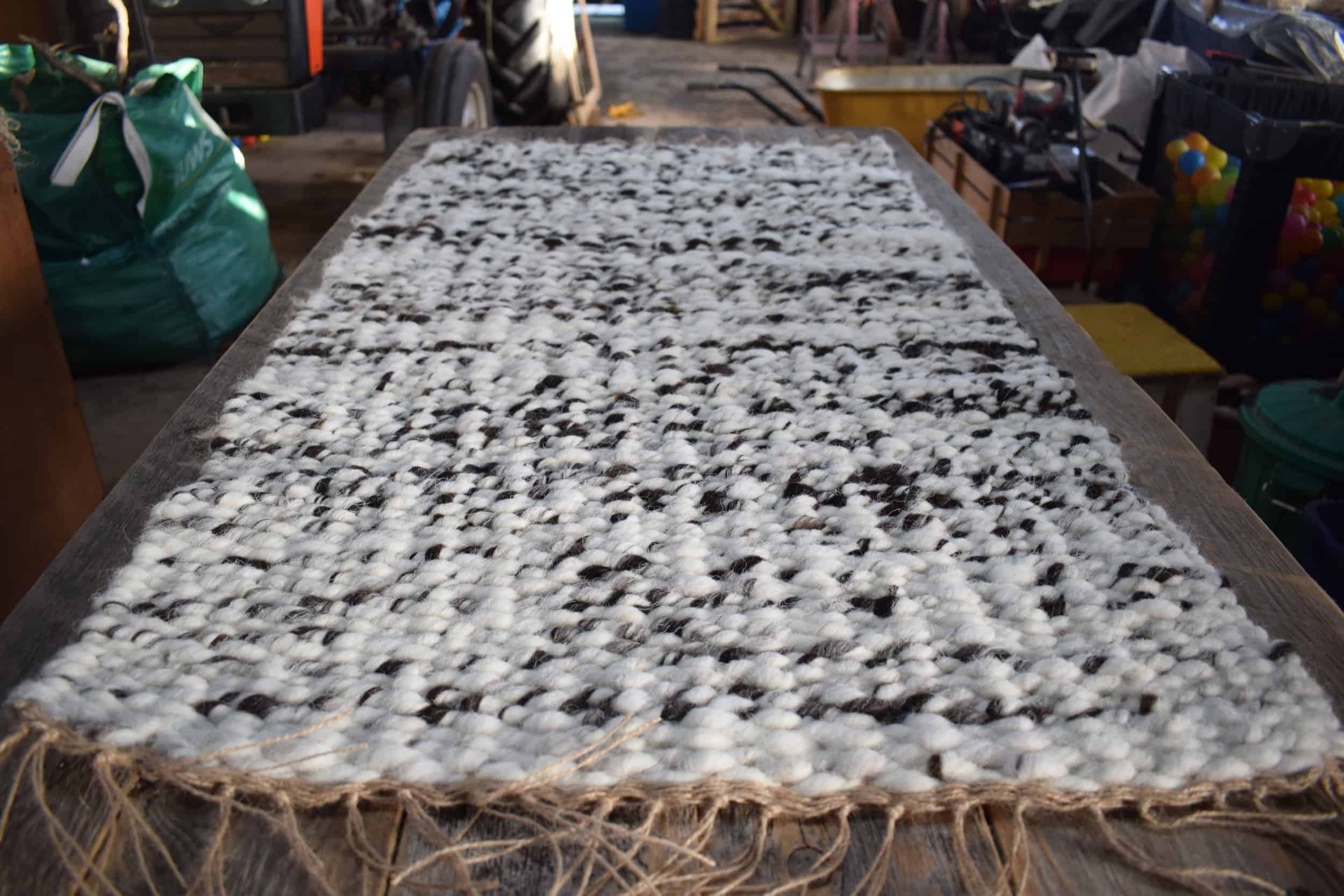 pegloom woven handmade large woven wool rug throw handmade brown white fern patchwork sheep