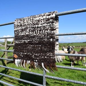 rustic handmade peg loom woven wool rug